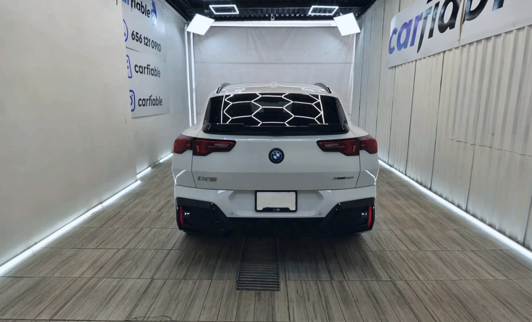 BMW iX2 xDrive30i 2025 — exterior 5 de 10