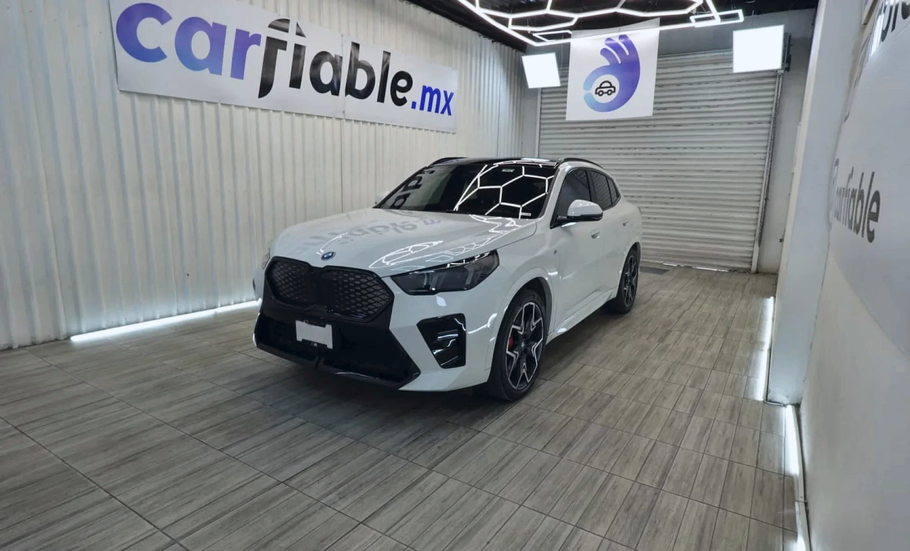 BMW iX2 xDrive30i 2025 — exterior 1 de 10