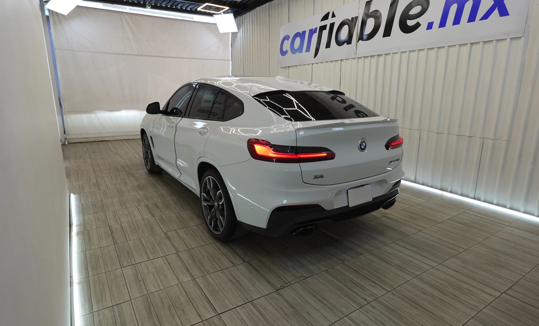 BMW X4 M40i 2021 — exterior 6 de 10